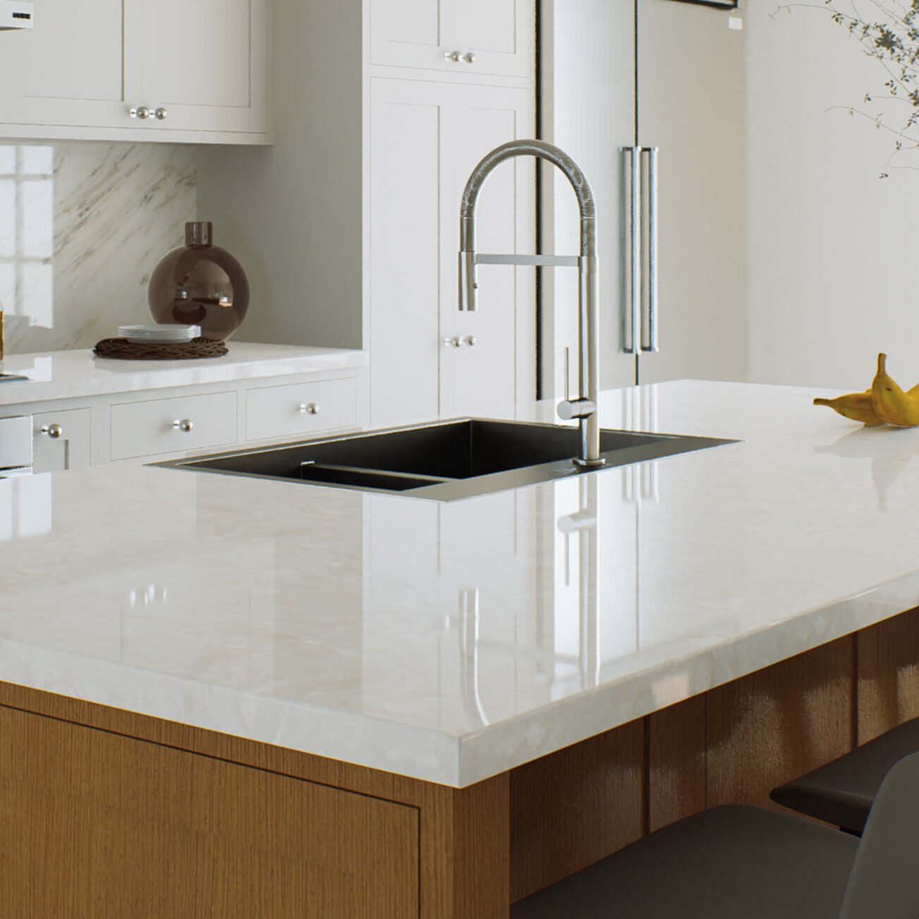 Professional performing sink refinishing in a residential kitchen.